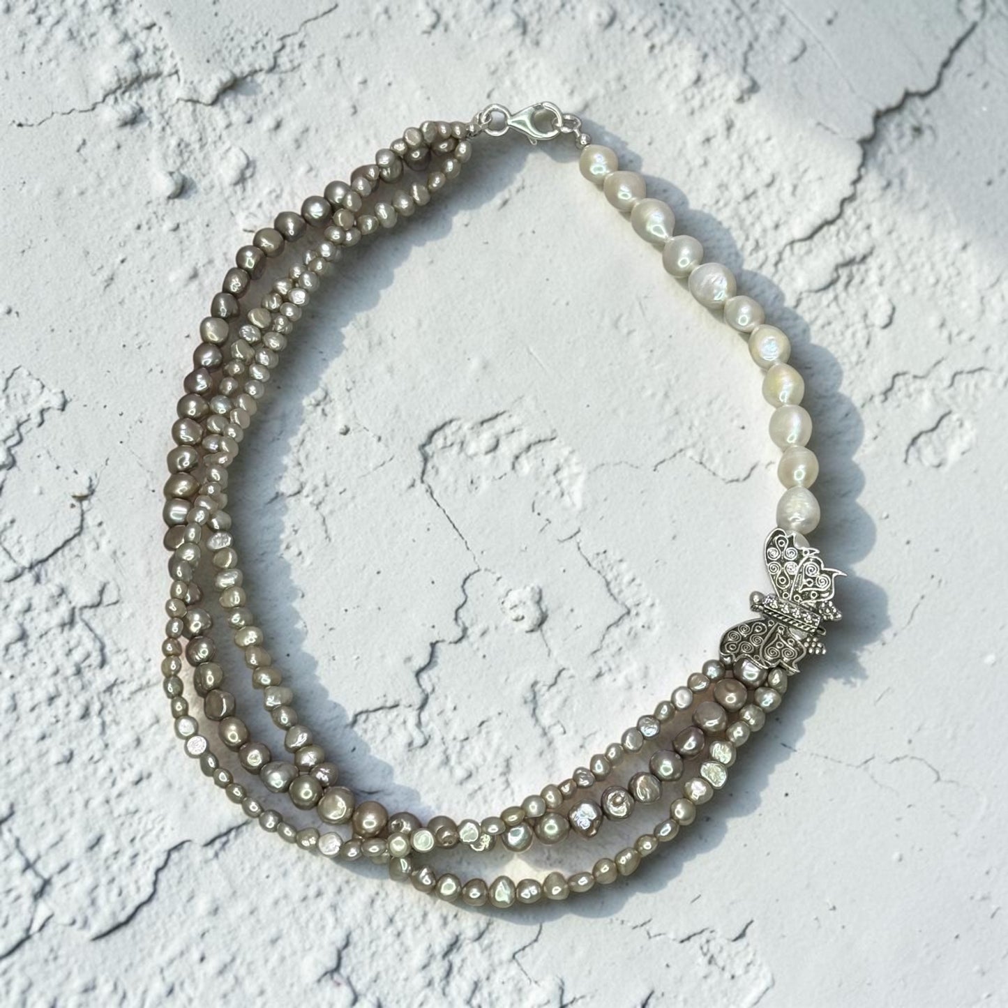 Flights of Fancy - Cream and Taupe Baroque Pearls and Handmade Sterling Silver Buttefly